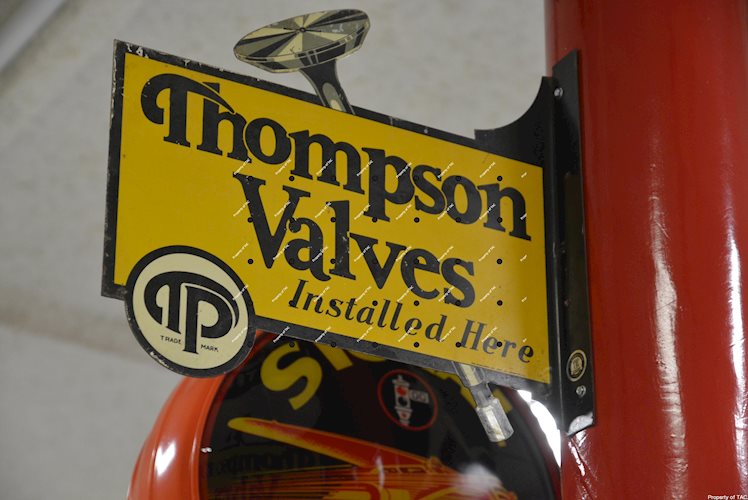 Thompson Valves Installed Here" sign"
