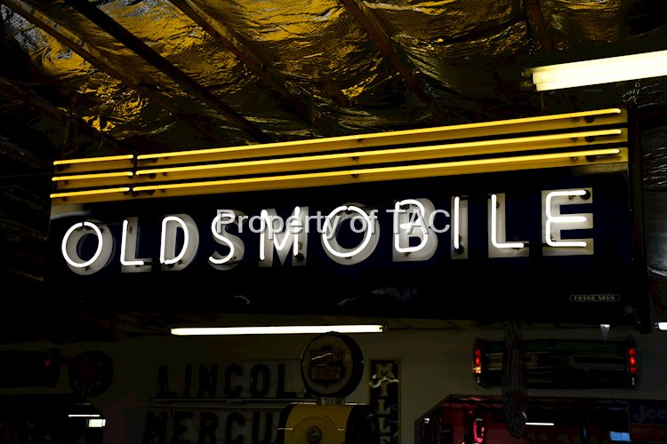 OLDSMOBILE 2- SINGLE-SIDED PORCELAIN NEON SIGN
