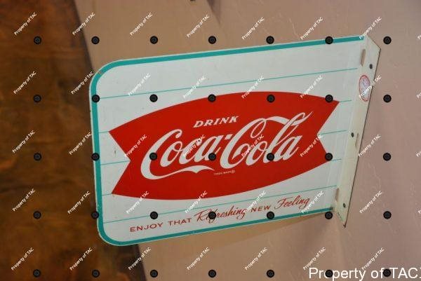 Drink Coca-Cola in fish tail logo sign