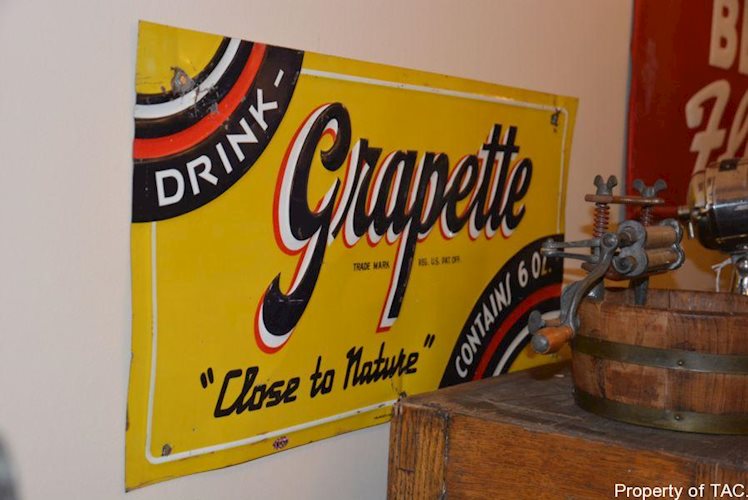 Drink Grapette Close to Nature" sign"