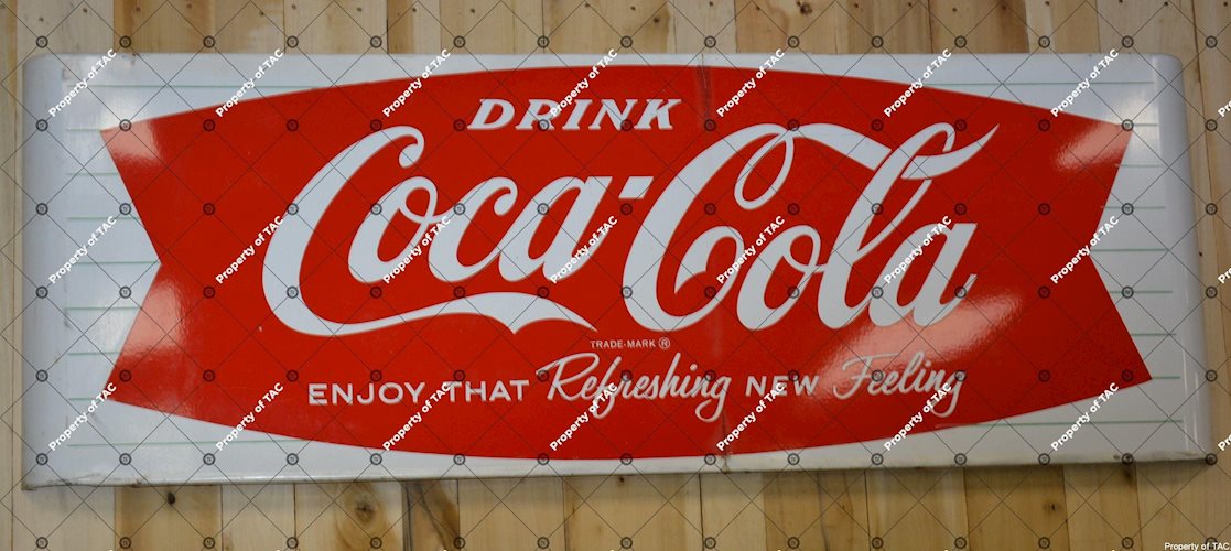 Drink Coca-Cola enjoy that Refreshing new feeling" sign"