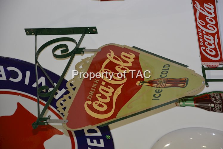 Drink Coca-Cola Ice Cold with bottle logo.