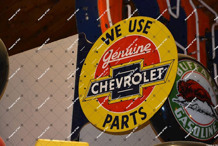 We Use Chevrolet Genuine Parts sign