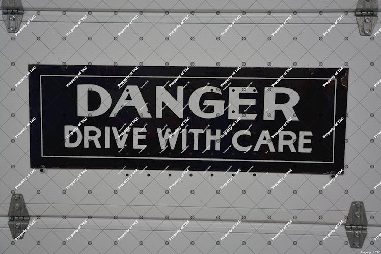 Danger Drive with Care sign