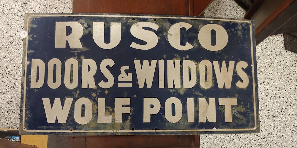 Rusco Doors & Windows Wolf Point Metal Sign