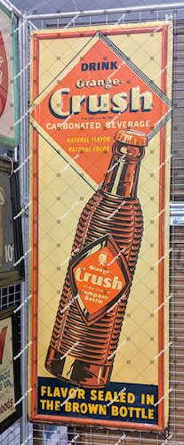 Drink Orange Crush Flavor Sealed in the Brown Bottle Embossed SST Single Sided Tin Self Framed Sign
