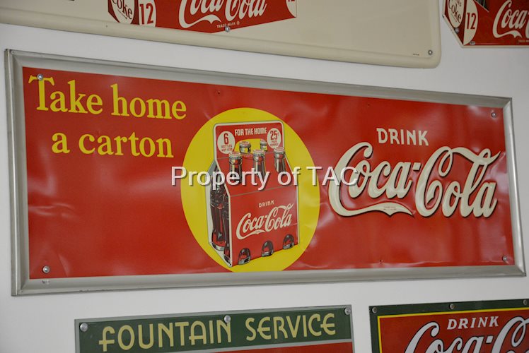 Drink Coca-Cola Take home a carton with six pack logo