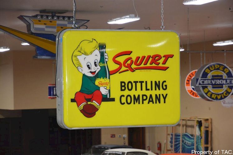 Squirt Bottling Company w/boy logo plastic inserts