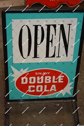 Enjoy Double Cola Open" sign"