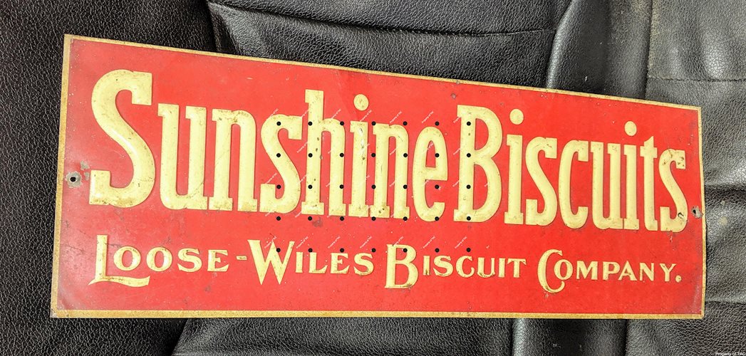 Sunshine Biscuits Loose Wiles Biscuit Company Embossed Tin Sign
