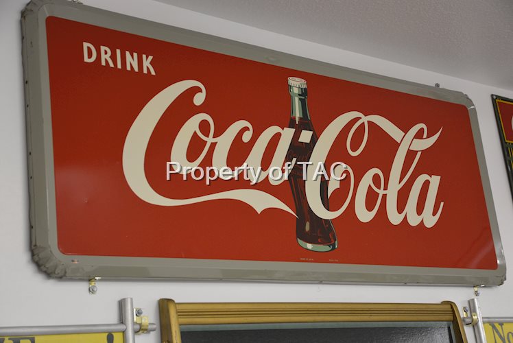 Drink Coca-Cola over bottle