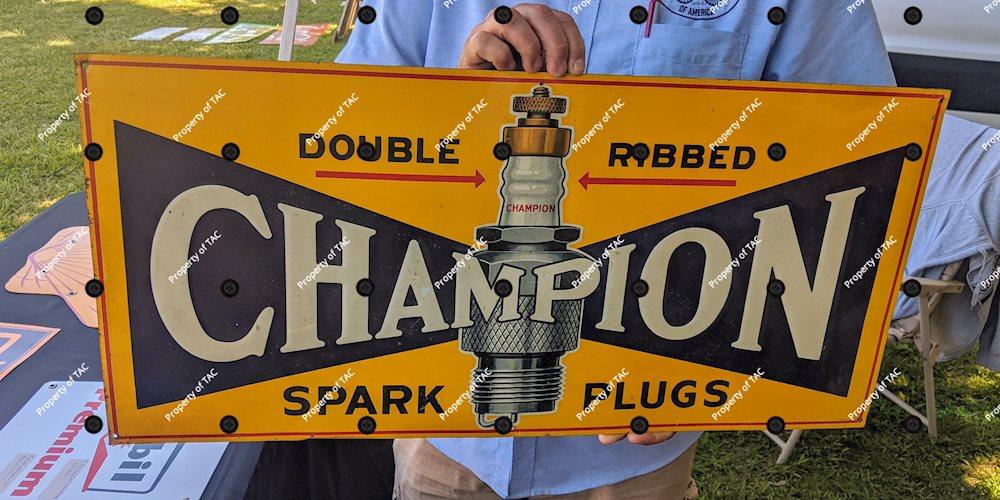 Champion Double Ribbed Spark Plugs Embossed Tin Sign