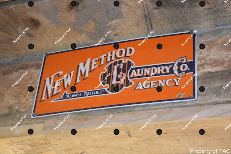 New Method Laundry Co Agency sign
