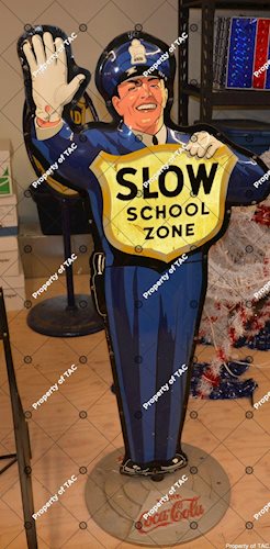 Coca-Cola Policeman Slow School Zone" sign"