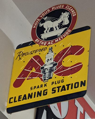 AC Spark Plugs Double Sided Tin Flange Sign w/ Sparky