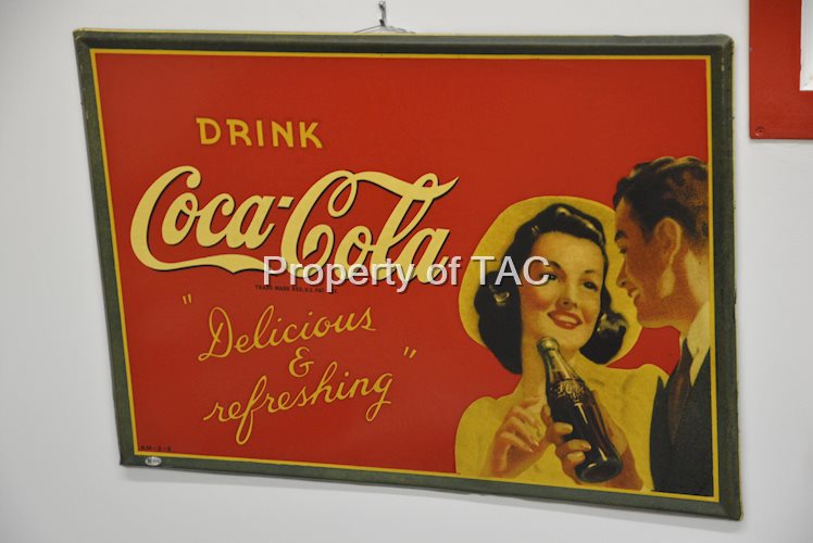 Drink Coca-Cola with couple holding a bottle