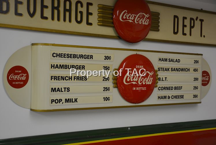 Drink Coca-Cola button on menu board