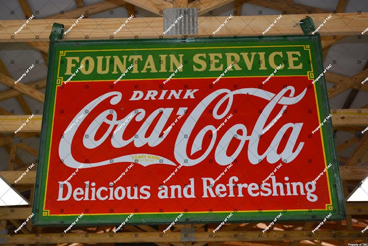 Drink Coca-Cola Delicious and Refreshing" Fountain Service sign"