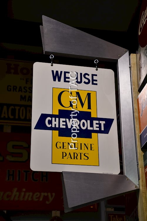 We Use GM Chevrolet Genuine Parts Metal Sign & Bracket