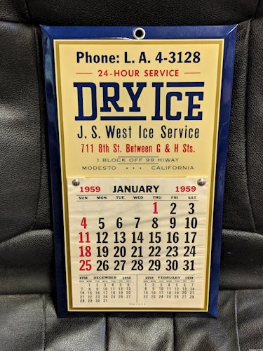 Dry Ice Single Sided Celluloid over Tin Calendar Sign Phone L.A. Hwy 99 Modesto California