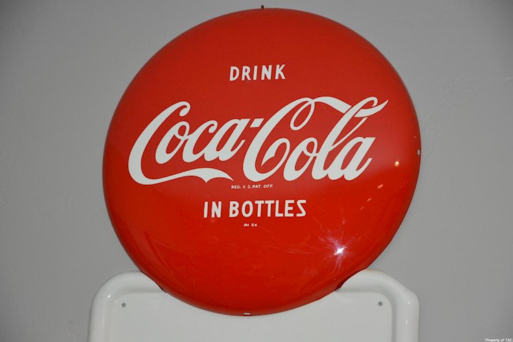 Drink Coca-Cola in bottles sign