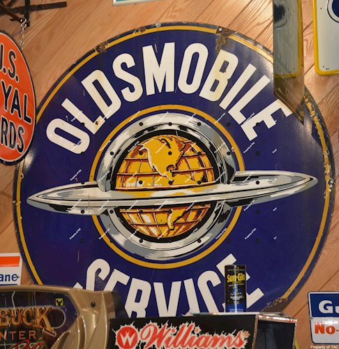 Oldsmobile Service w/Saturn logo porcelain sign