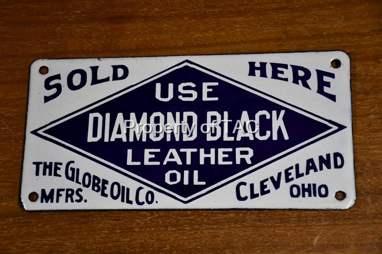Use Diamond Black Leater Oil "Sold Here" Porcelain Sign