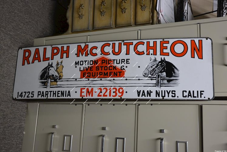 Ralph McCutcheon Motion Picture Livestock & Equipment porcelain sign