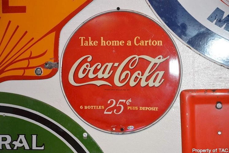 Coca-Coca Take home a cartoon" sign"