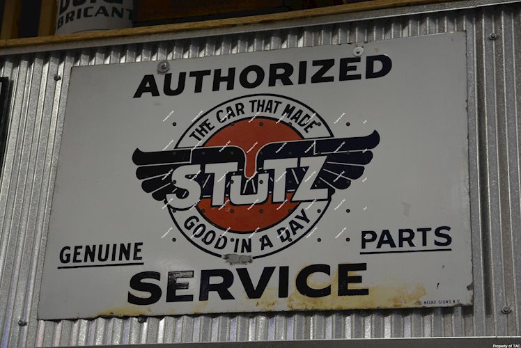 Stutz Authorized Service The Car that made Good in a day" sign"