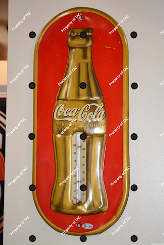Coca-Cola tin thermometer w/gold Christmas Bottle