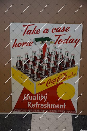 Coca-Cola Take a Case Home Today" sign"