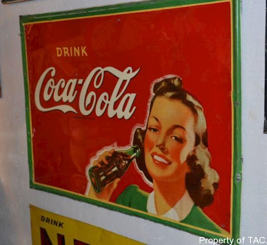 Drink Coca-Cola w/lady sign