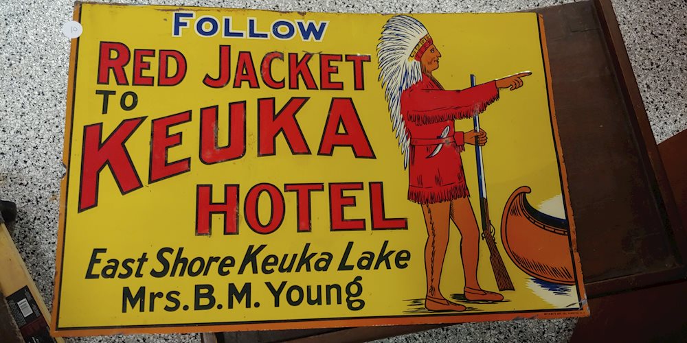 Follow Red Jacket to Keuka Hotel w/Indian Graphics Metal Sign